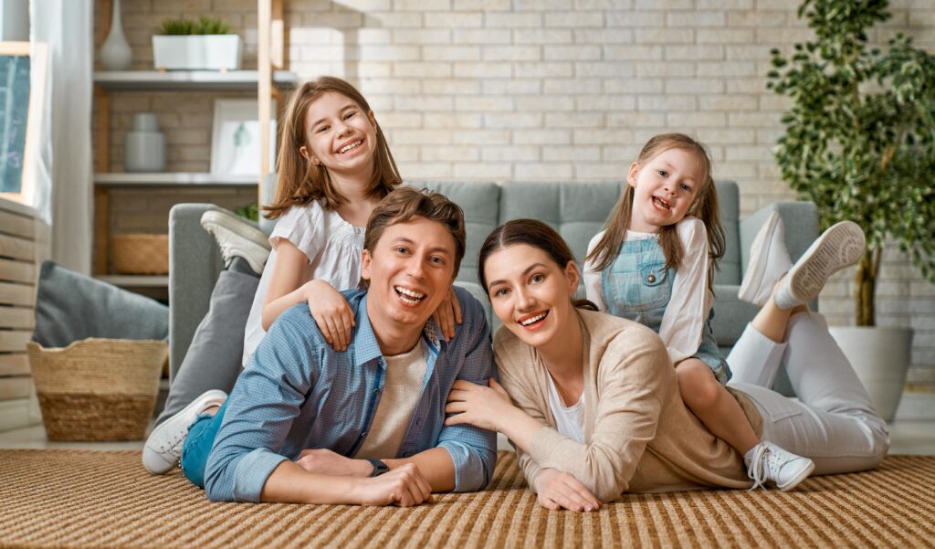 Happy family enjoying home comfort with HVAC Services in Scottsdale, AZ. Air conditioning benefits | Accurate Air